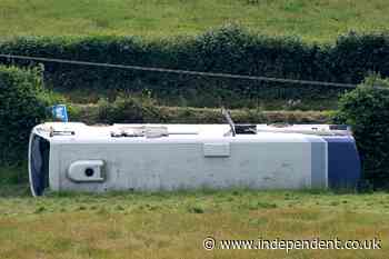 19 injured after bus crash at roundabout in Wales