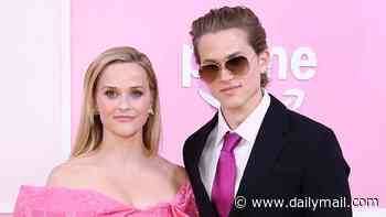 Reese Witherspoon's son Deacon Phillippe, 22, towers over her at the premiere of Legally Blonde prequel Elle