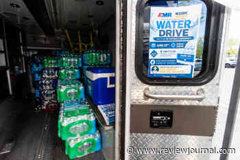 Amid extreme heat, private ambulance crews collect water for Las Vegas homeless shelter
