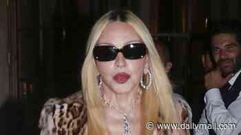 Madonna, 67, struts her stuff in lace silk nightwear and knee-high boots as she turns heads at Men's Paris Fashion Week