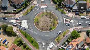 Section of 'magic roundabout' closes as massive sinkhole opens up near interchange that baffles drivers, cyclists and pedestrians with its 36 traffic lights