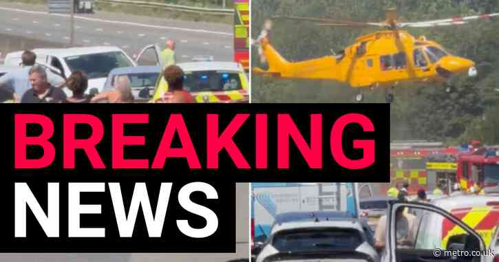 Drivers get out of baking cars after M25 crash during red alert heatwave