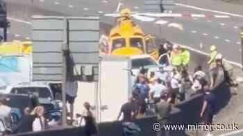 M25 live: Hour-long delays in blistering heat as air ambulance called to crash