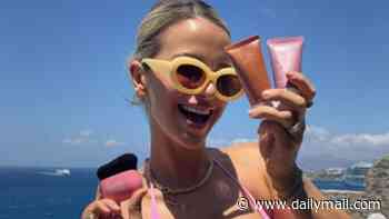 Pregnant Vogue Williams shows off her bump in a plunging pink bikini in Mykonos babymoon throwback as she battles the scorching heatwave