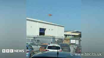 Man trapped by lorry at industrial estate