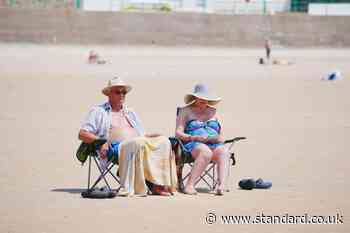 Scotland records hottest day of year as travel disruption warnings issued