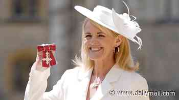 Coronation Street star Sally Lindsay looks stunning in an elegant white suit as she receives her MBE for her services to drama