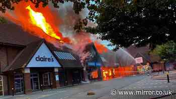 Boys, 13, arrested over massive fire at shopping centre causing part demolition