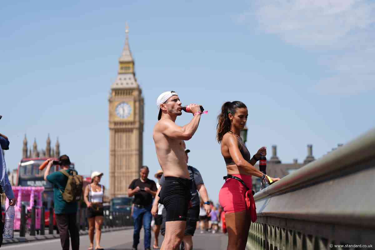 London heatwave LIVE: Temperature hits 35.1C as capital 'risk to life' warning extended and UK records hottest ever June day