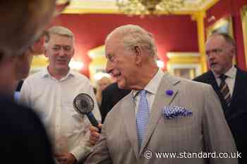 King feels the heat in stifling conditions at climate event