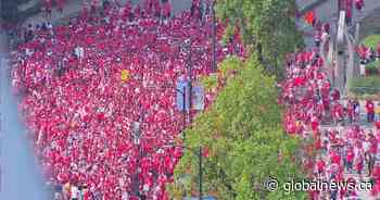 Thousands of Canada, Switzerland fans march to BC Place ahead of game