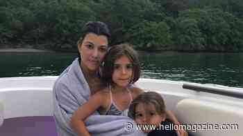 Kourtney Kardashian's turns heads in beach photo with new family update