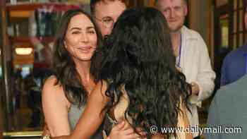 Simon Cowell and Lauren Silverman greet his ex Sinitta at Sinatra The Musical after the singer said their romance was a 'bitter pill to swallow'