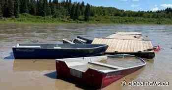 Wayward dock and boats found 300 km downstream from Edmonton