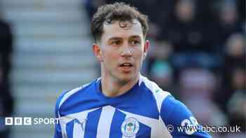 Wigan midfielder Weir signs new two-year deal