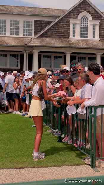 Clutch. Paulina Gretzky got DJ to sign a hat and flag for a young fan.