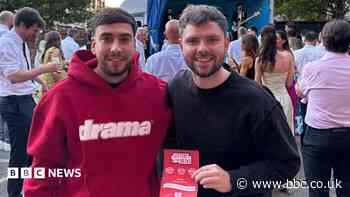 Friends open World Cup fan zone at historic baths