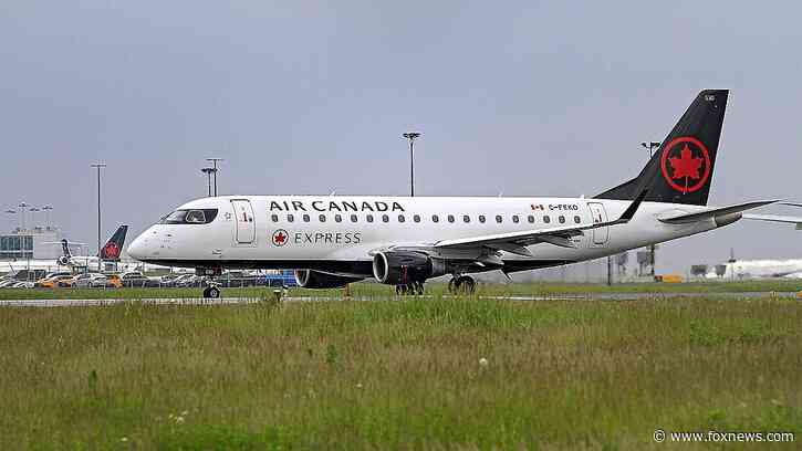 Air Canada flight with 61 passengers diverts to Boston after captain is removed from cockpit midair