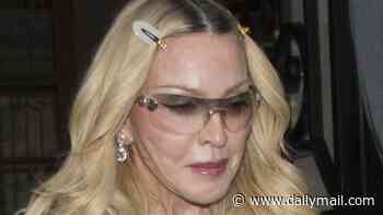 Madonna, 67, suffers embarrassing wardrobe mishap in VERY short blue dress during Paris Fashion Week