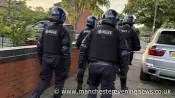 Two men arrested as police storm Bolton house in early morning raid