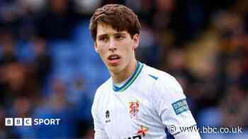 Ex-Oxford Utd centre-back Negru joins Swindon
