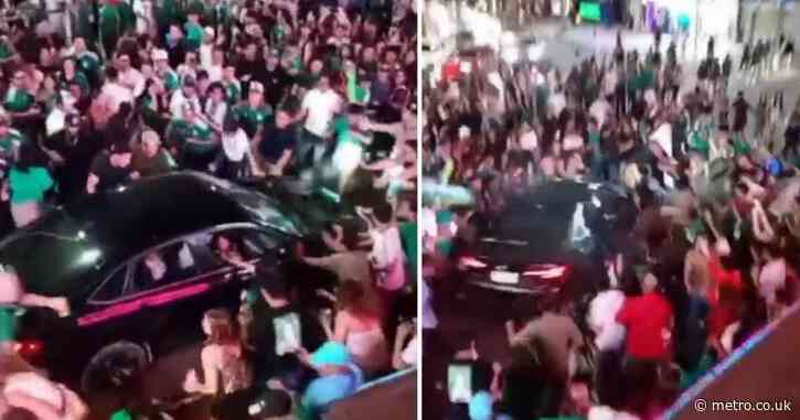 Car ploughs through crowd of World Cup fans injuring 17