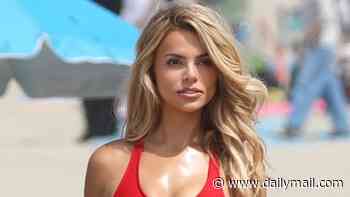 Brooks Nader shows off her Baywatch babe body in iconic red swimsuit as she shoots beach scenes in Malibu