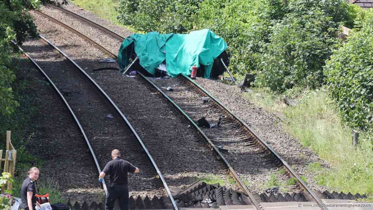 Devastating aftermath in Lancashire as person dies and child fighting for life after train crashes into car