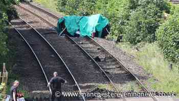Devastating aftermath in Lancashire as person dies and child fighting for life after train crashes into car