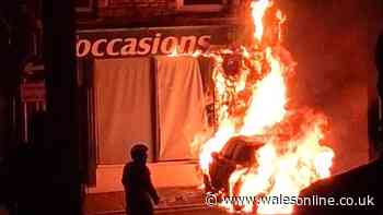 Shop ruined after car explodes and rolls into it