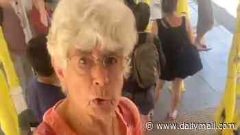 Shocking moment man BLOCKS 80-year-old woman trying to go up stairs from Tube platform and refuses to move as he tells her: 'You've got legs'