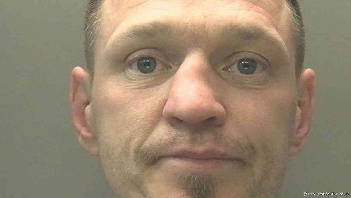 Man walks around with axe outside Cardiff police station