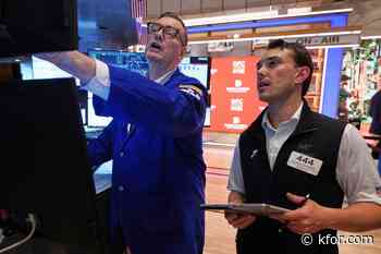 Wall Street drifts in mixed trading after Micron soars and Apple drops