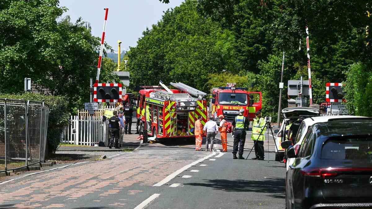 Woman dies and, girl, 8, fighting for her life at Alder Hey after train hits car