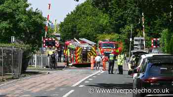 Woman dies and, girl, 8, fighting for her life at Alder Hey after train hits car