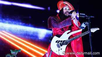 Heatwave? What heatwave? As London swelters, Empire Of The Sun's frontman takes to the stage in sequinned gown - and Samurai hat. Read our review...