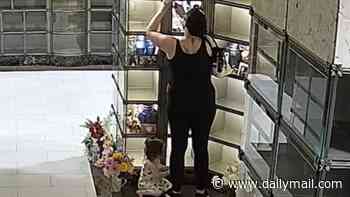 Utter humiliation for Houston mother, 37, who took toddler with her to steal from mausoleum as she's arrested in VERY unflattering outfit