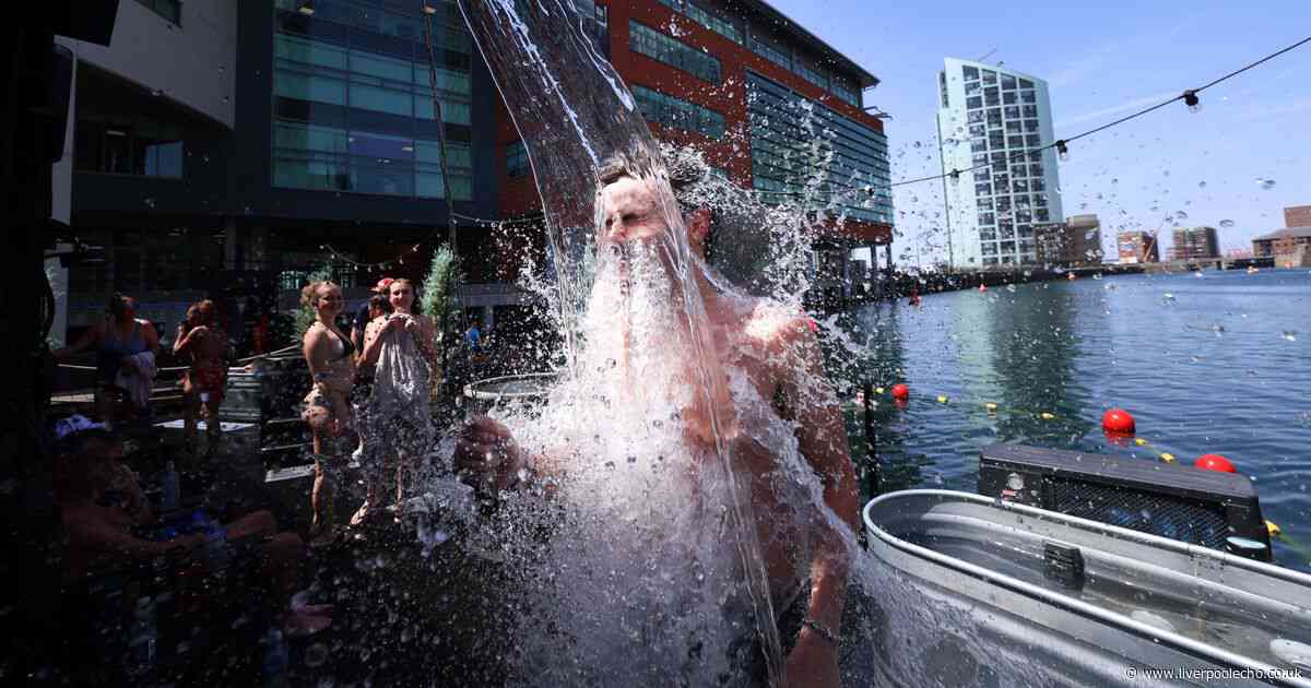 13 photos as Liverpool bakes on hottest day of the year