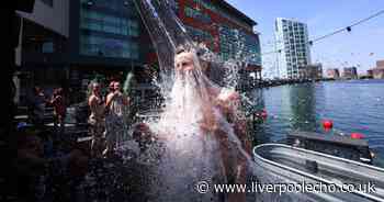 13 photos as Liverpool bakes on hottest day of the year