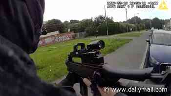 Moment van driver stops and gives armed police a LIFT to chase a suspect