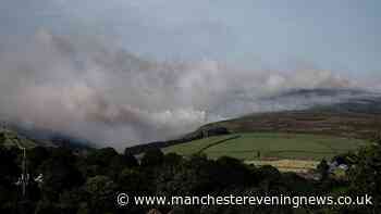 Ash falls over Greater Manchester and smoke clouds smother region as moorland fire rages on for 24 hours