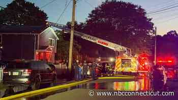 8 people, 4 dogs displaced after house fire in Hamden