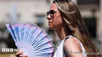 In pictures: Britain swelters in record-breaking June heat