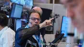 Wall St ends mixed as shares in tech companies slide