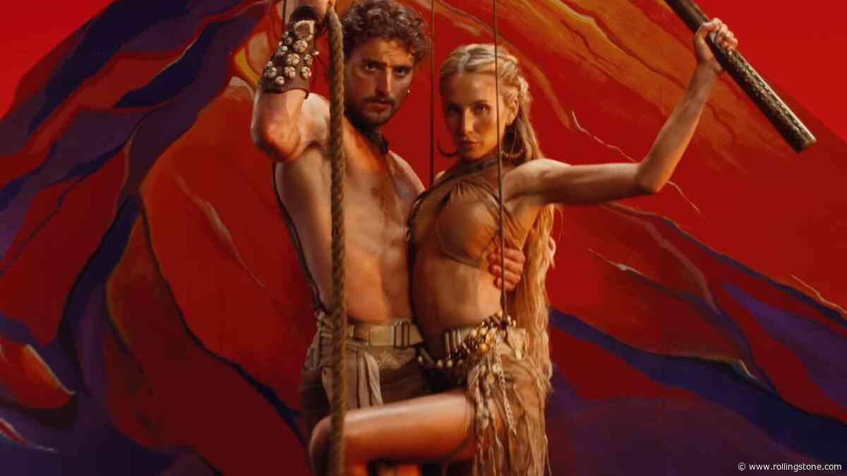 Benson Boone and Alix Earle Fight Dragons, Lock Lips in ‘The Time of My Life’ Video
