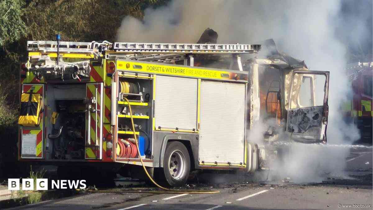 Firefighters battle blaze on their own engine