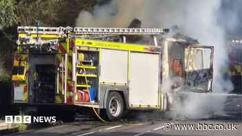 Firefighters battle blaze on their own engine