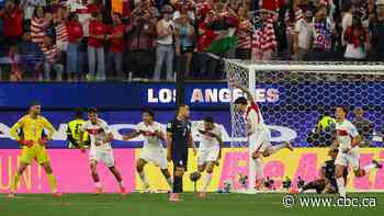 Turkey beats U.S. with last-gasp goal as Americans look ahead to knockout stage