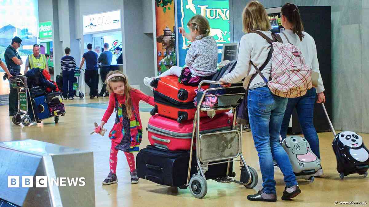 Ryanair says it will reluctantly not charge parents to sit next to children