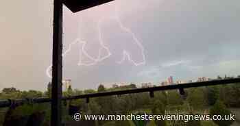 Incredible images as Greater Manchester wakes up to thunder and lightning with weather warning still in place